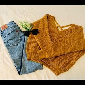 Preloved sweater & Levi's jeans.